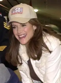 Kelly Preston interpreta Greer Latimore