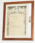Diploma e medaglia.