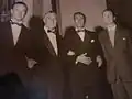 Luciano Chailly, Bindo Missiroli (direttore Teatro Donizetti), Dino Buzzati e il regista Enrico Colosimo alla prima di "Ferrovia Sopraelevata" (Bergamo, 1955 Teatro Donizetti)